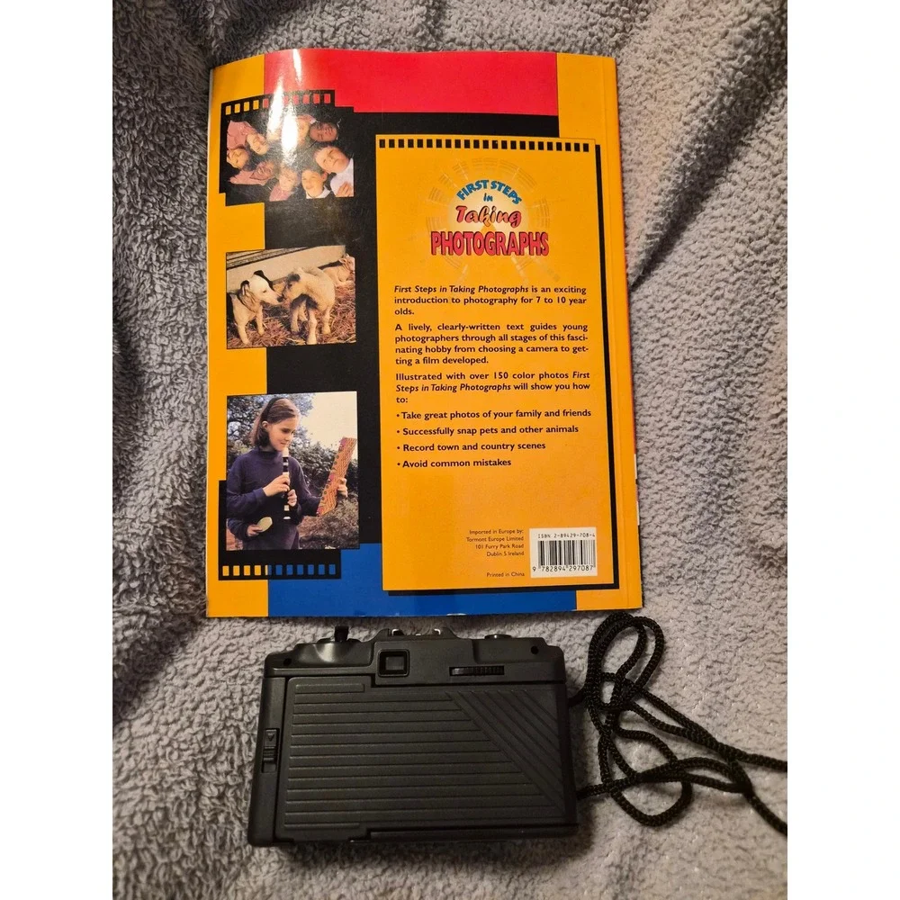 Vintage 35mm Focus Free Point and Shoot Film Camera with Photography Guide Book